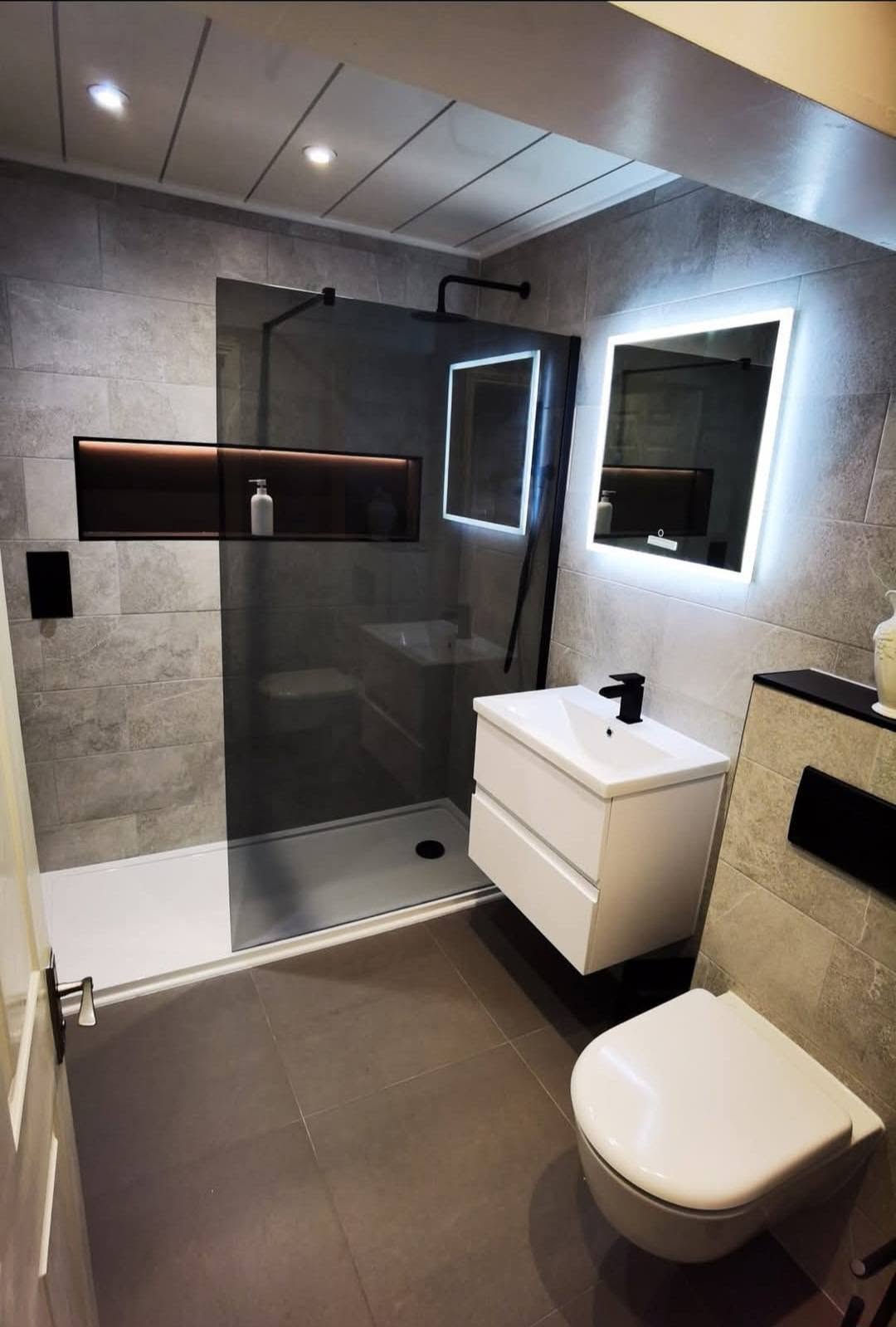Walk-in shower renovation with matt black fittings