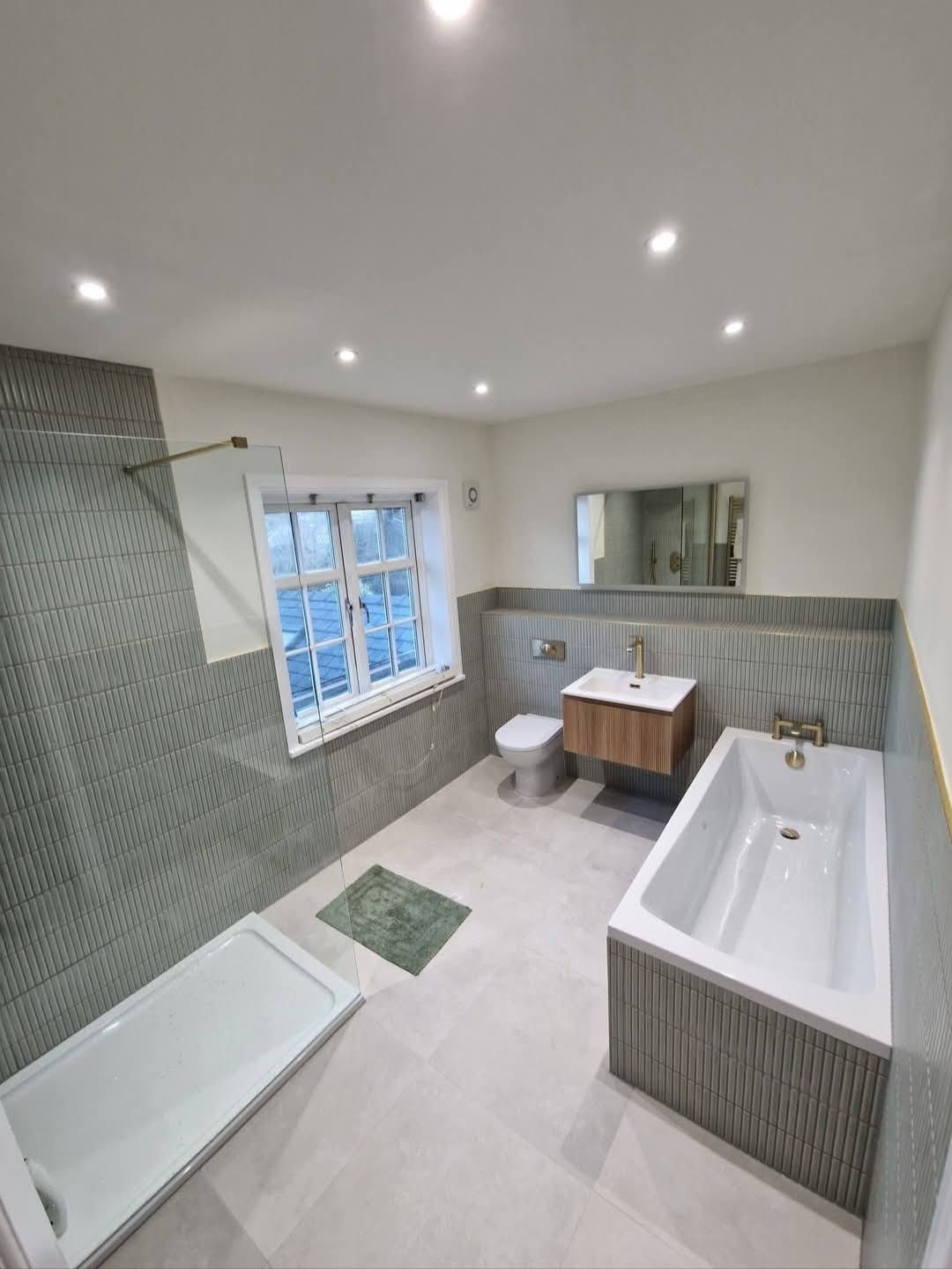 Family bathroom renovation in Stockport with brushed brass fittings