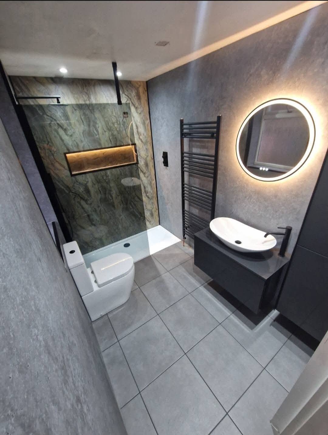 Shower room with a feature stone wall and concealed pipework, Ashburys Property Renovations, Stockport