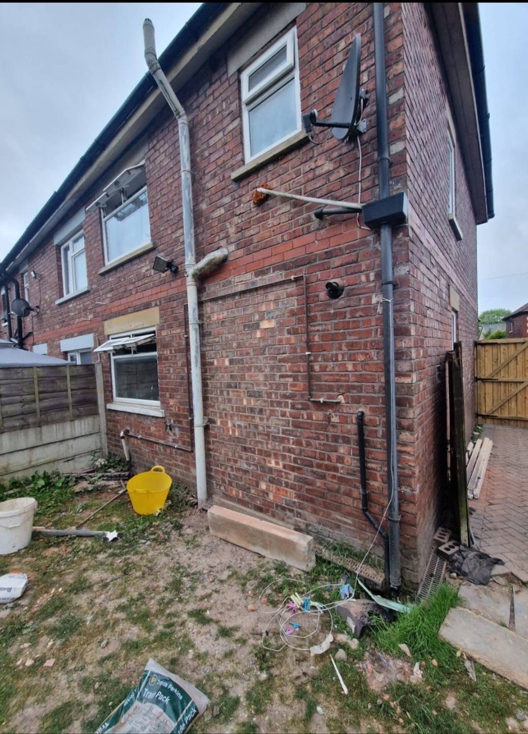 Before: the rear of the house ahead of the outside works