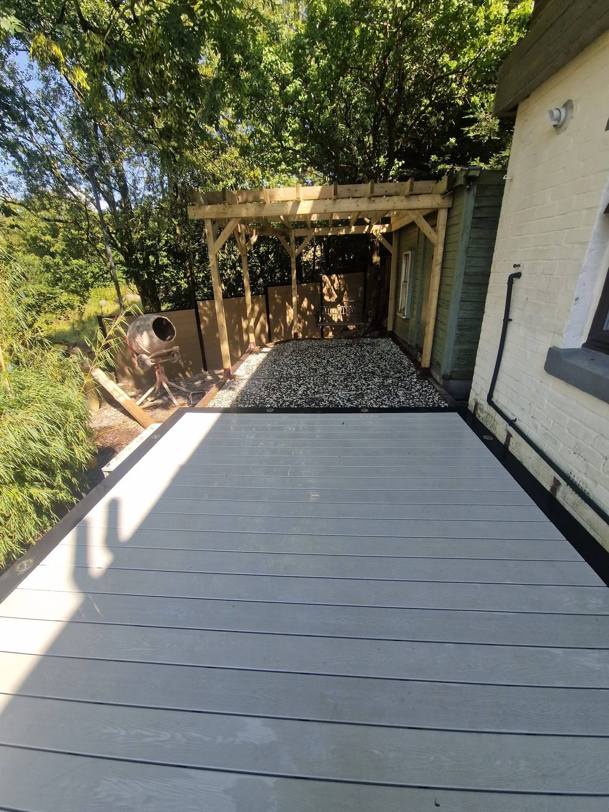 Composite deck and pergola from the house side
