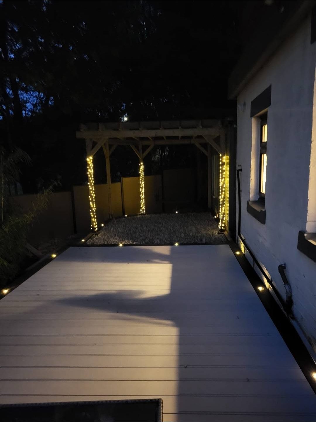 The finished deck lit up at night