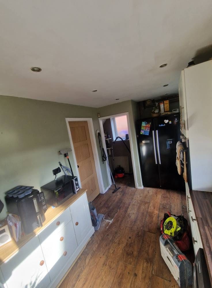 Before: the old kitchen from the dining side