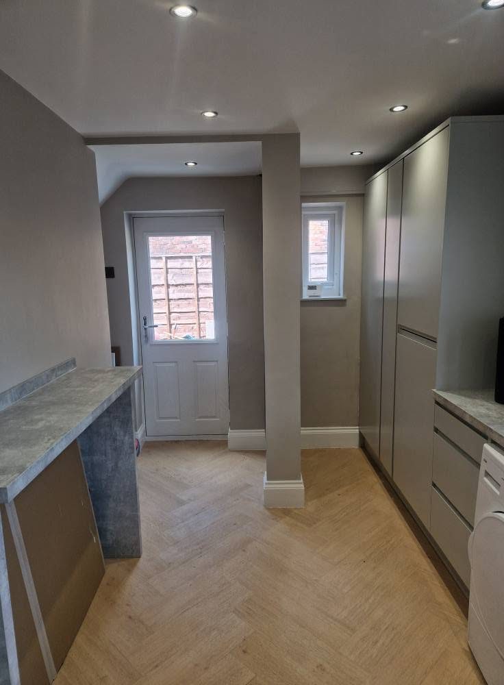 Fitted storage and worktop in the new utility area